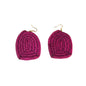 Pair of pink spiral raffia earrings