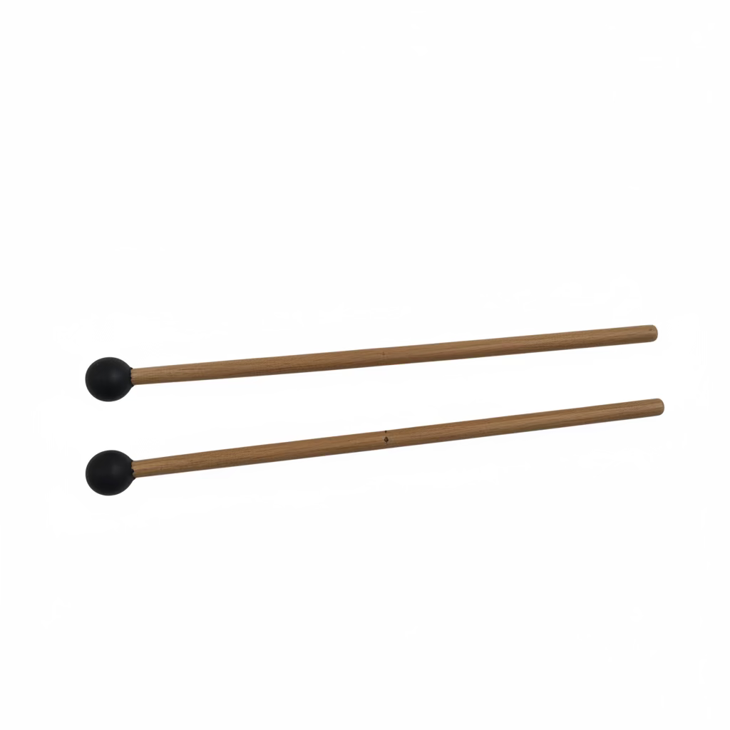 Two wooden matchsticks with black tips resting on a corrugated off-white surface.